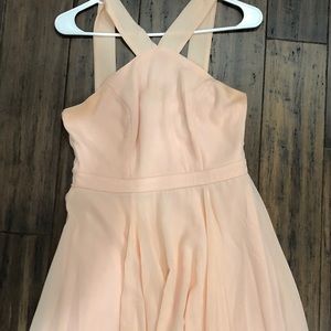 It’s a light peach pink special occasion dress